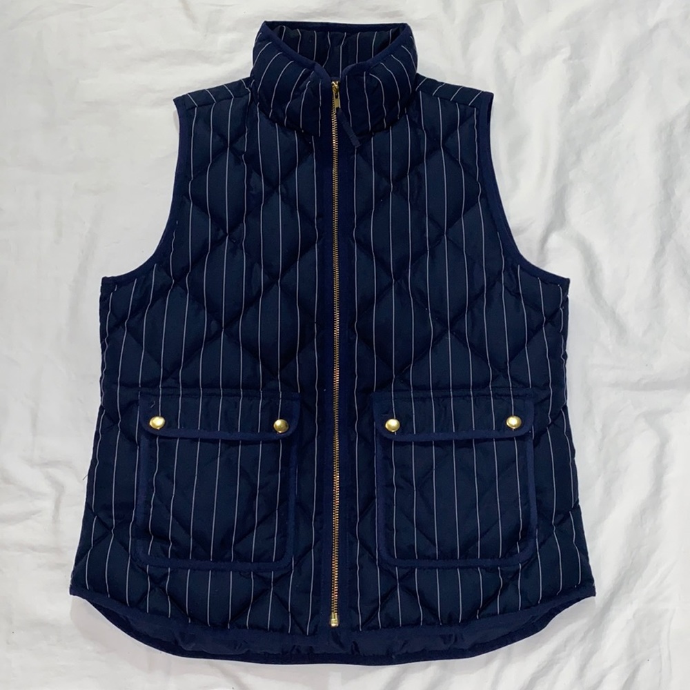 Woman’s J. Crew puffer vest.